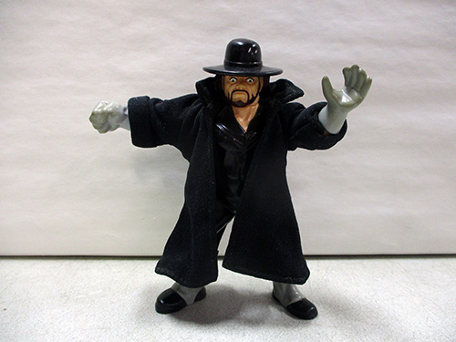 image of Undertaker wrestling figure