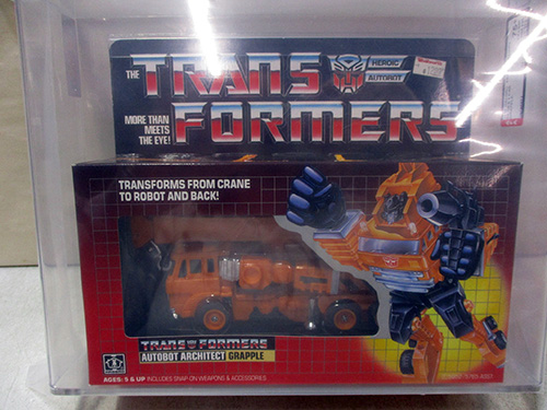 image of Transformers G1 Autobot Grapple in Original Packaging AFA graded
