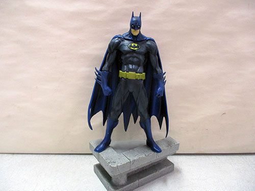 image of Batman Figurine on Pedestal Display
