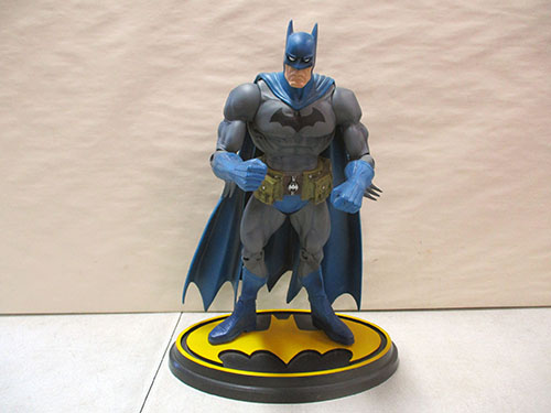 image of Batman Figurine on Oval Bat-Symbol Base