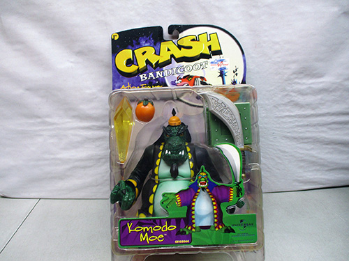 image of Crash Bandicoot Komodo Moe Action Figure in Original Packaging