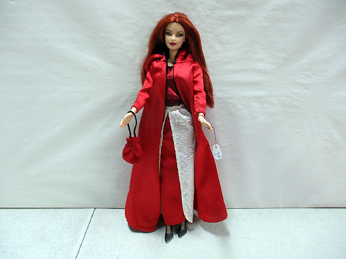 image of Barbie Red-Haired Fashion Doll in Red Cape Ensemble