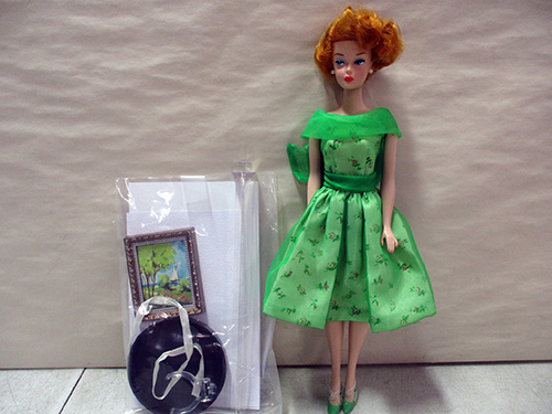 image of Barbie Doll with Accessories in Green Outfit