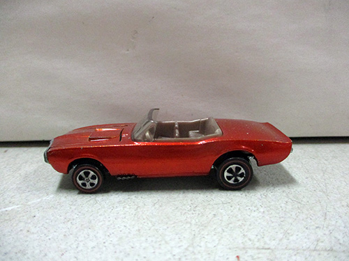 image of Hot Wheels Redline Light My Firebird red