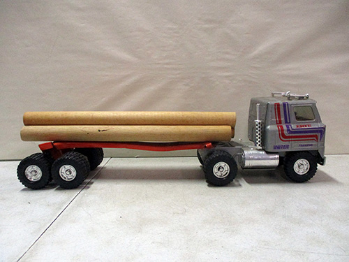 image of Ertl Toy Logging Truck with Trailer and Logs
