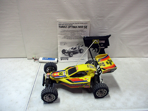 image of Kyosho Turbo Optima Mid SE RC Buggy with Controller