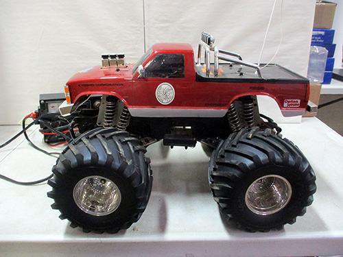 image of Kyosho Red Remote-Controlled Monster Truck Toy