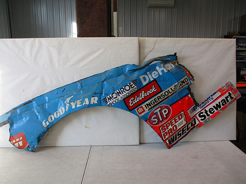 image of NASCAR Crash-Damaged Body Panel with Sponsor Logos
