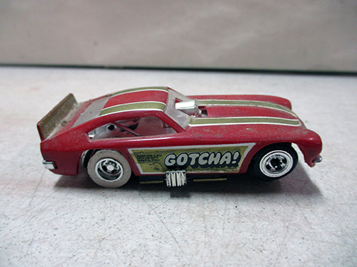 image of Aurora funny car HO scale slot car with 'Gotcha!' Decal